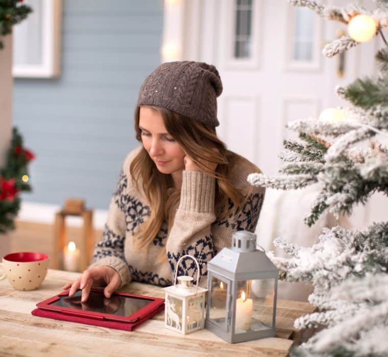 woman at christmas on laptop